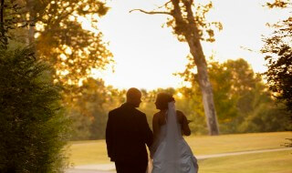 Wedding photographer capturing a couple during their ceremony
